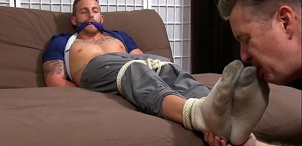  Inked hunk Jake is restrained and has his feet worshipped